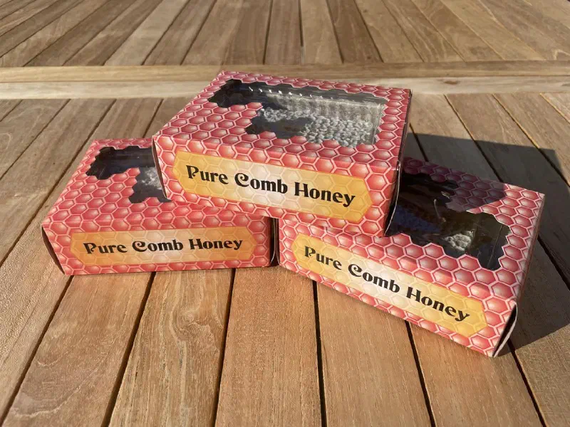 Boxes of Brundall Bee pure comb honey