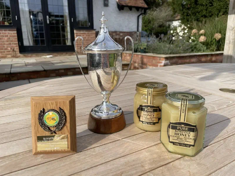 The Padmore Challenge Cup with our prize-winning soft set honey